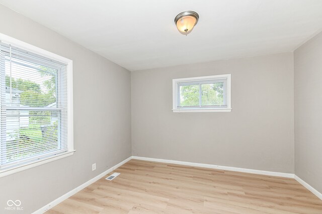 empty room featuring light hardwood / wood-style floors