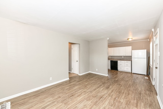 unfurnished living room with light wood-type flooring