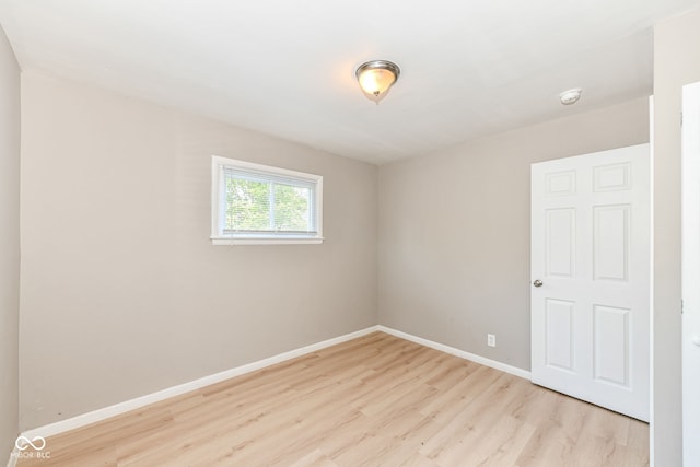 unfurnished room featuring light hardwood / wood-style flooring