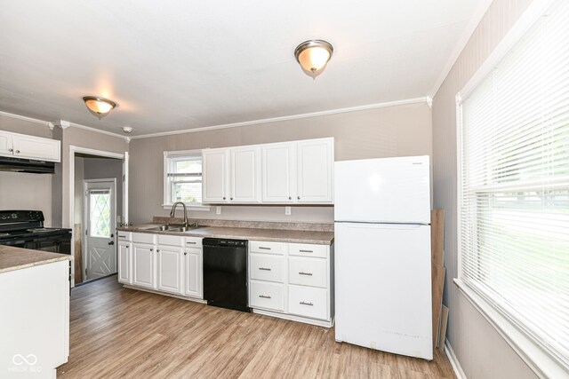 kitchen featuring light hardwood / wood-style flooring, sink, black appliances, crown molding, and white cabinetry