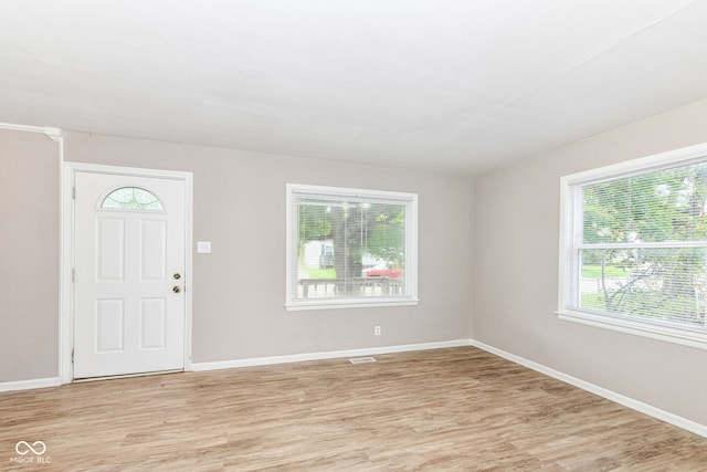 foyer with light hardwood / wood-style flooring