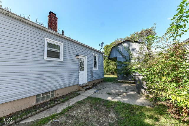 rear view of house featuring a patio area