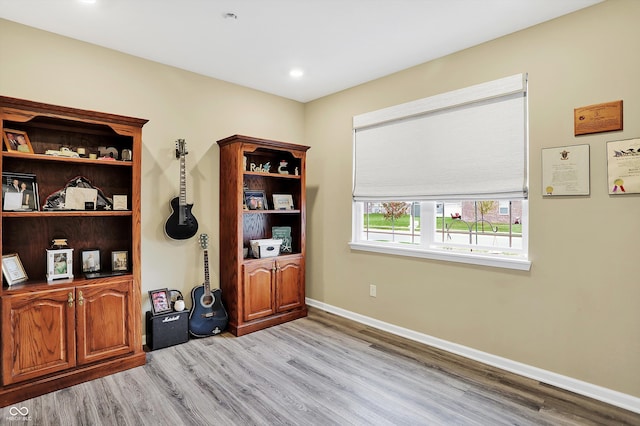 office space with light wood-type flooring