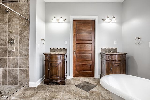 bathroom featuring vanity and plus walk in shower