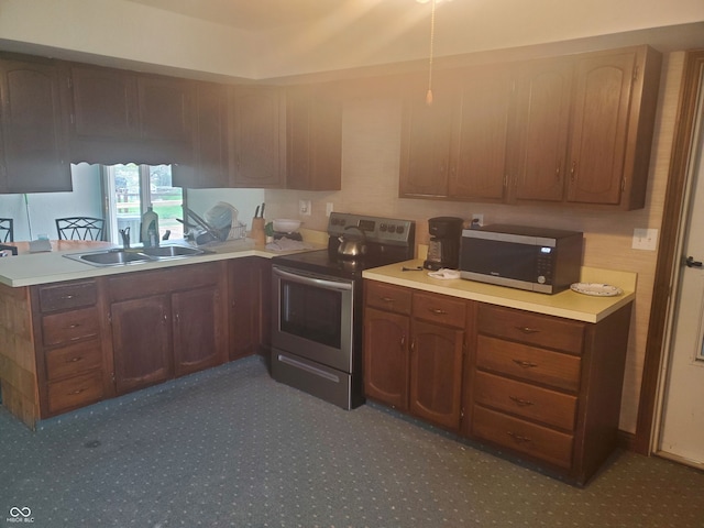 kitchen featuring sink and appliances with stainless steel finishes