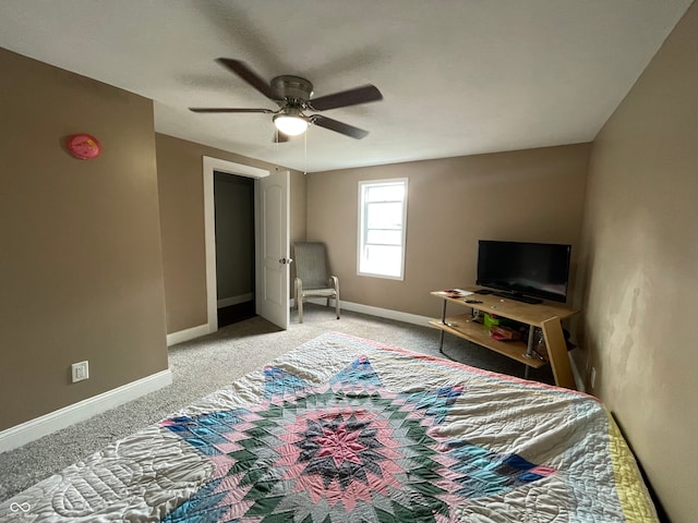 bedroom featuring ceiling fan and light carpet