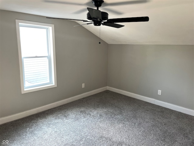 bonus room featuring ceiling fan, vaulted ceiling, and carpet flooring