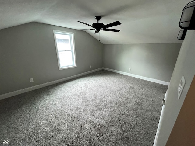 bonus room featuring lofted ceiling, ceiling fan, and carpet floors