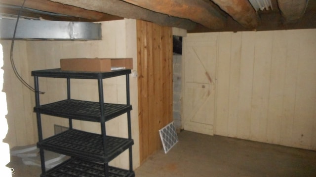 basement with wooden walls