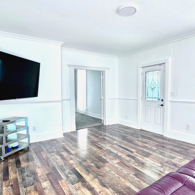 living room featuring crown molding and dark hardwood / wood-style floors