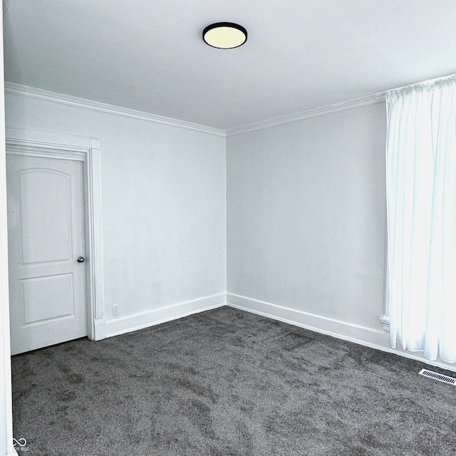 carpeted empty room with ornamental molding