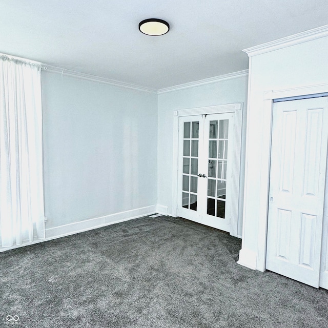 carpeted empty room featuring crown molding and french doors