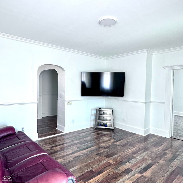 living room featuring crown molding and dark hardwood / wood-style flooring