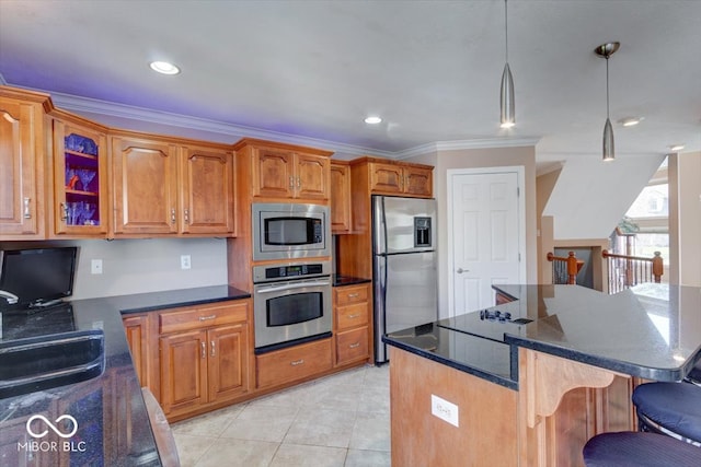 kitchen featuring stainless steel appliances, a center island, light tile patterned floors, ornamental molding, and decorative light fixtures