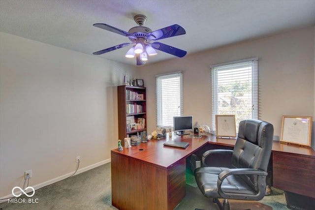 office space featuring carpet floors and ceiling fan