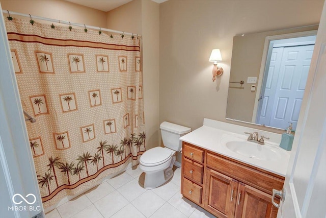 full bathroom with curtained shower, toilet, vanity, and tile patterned floors