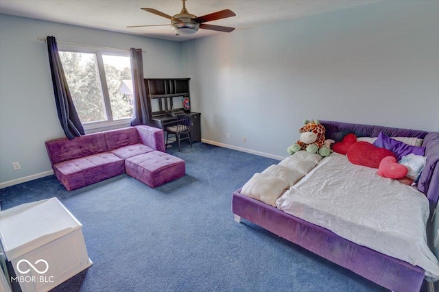 carpeted bedroom featuring ceiling fan and baseboards