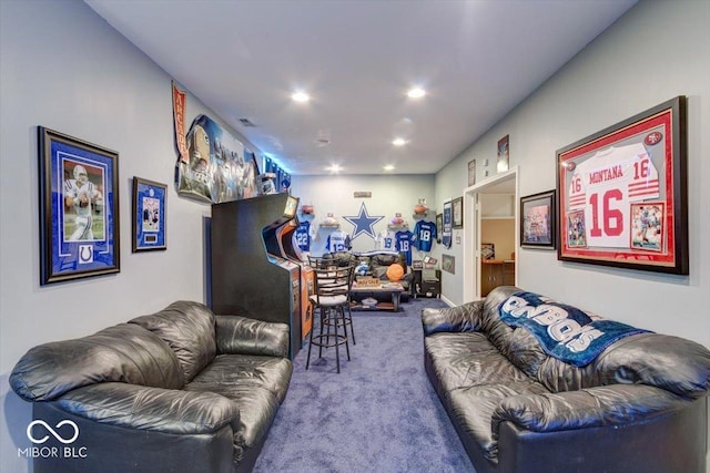 carpeted living area featuring visible vents and recessed lighting
