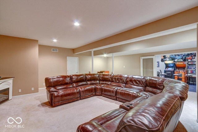 living room featuring recessed lighting, carpet floors, visible vents, and baseboards