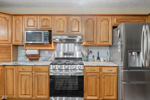 kitchen with appliances with stainless steel finishes