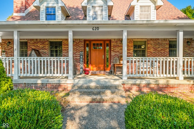 entrance to property with covered porch