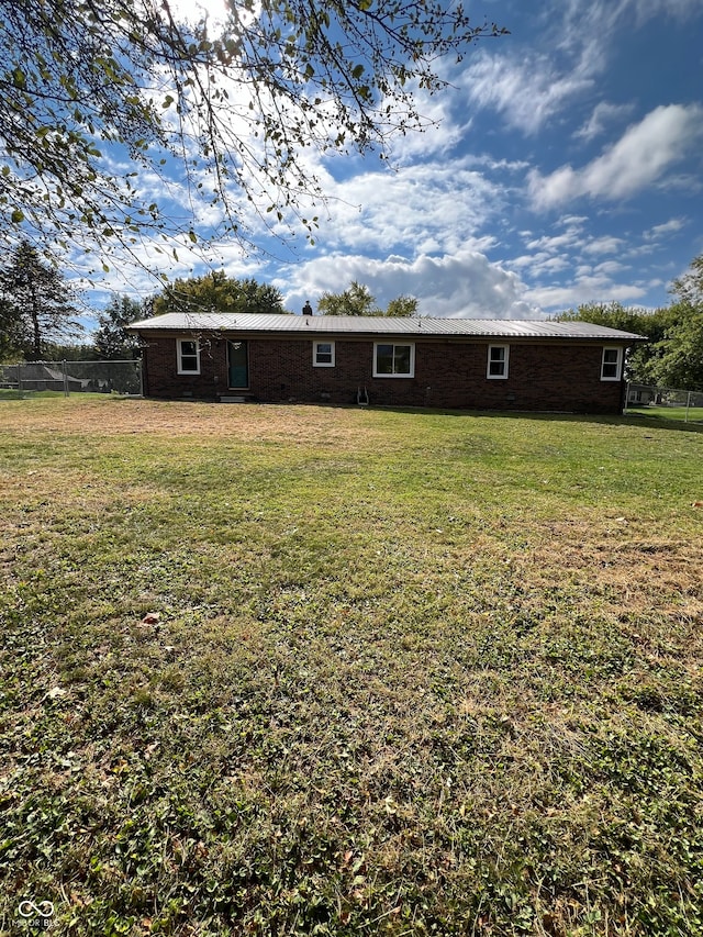 exterior space featuring a lawn