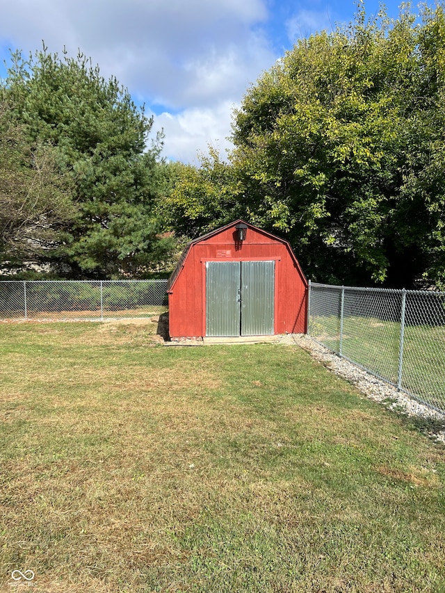 view of outdoor structure with a yard