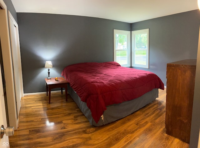 bedroom featuring dark hardwood / wood-style floors