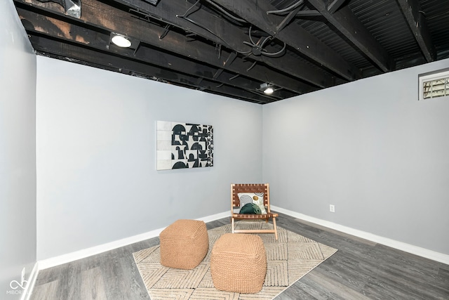 living area featuring dark wood-type flooring