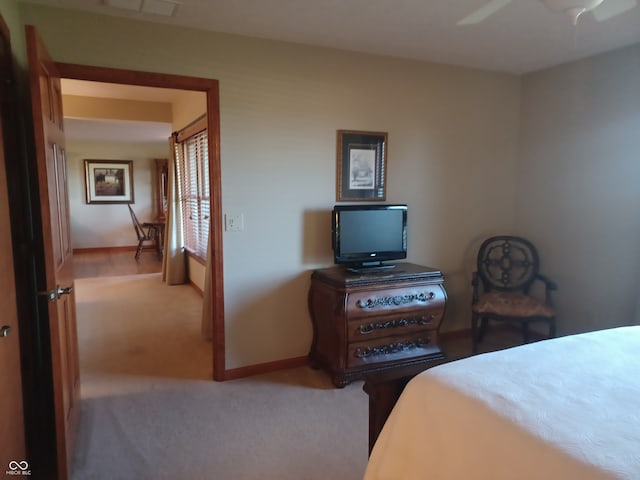 bedroom with carpet flooring and ceiling fan