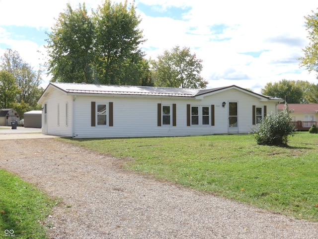 view of front of home with a front yard