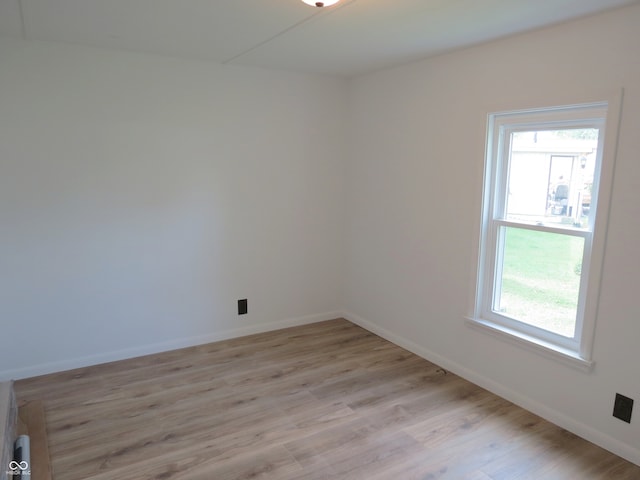 unfurnished room featuring light wood-type flooring