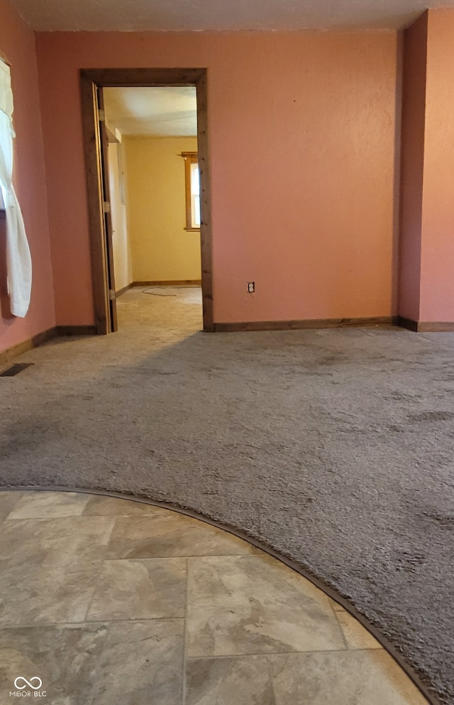 spare room with carpet floors