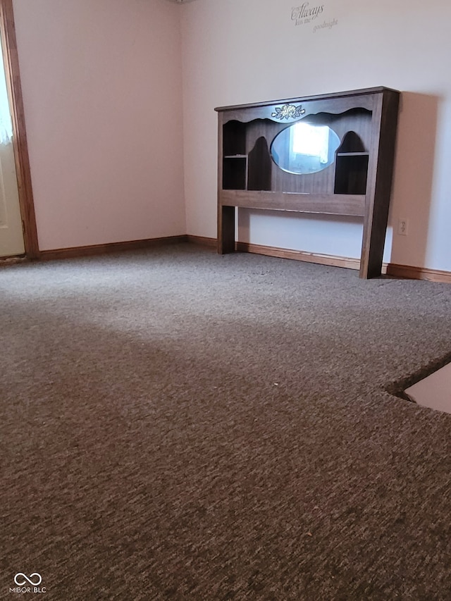 spare room with carpet