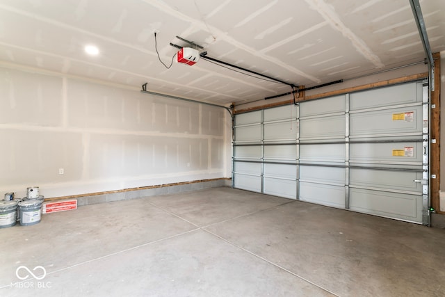 garage featuring a garage door opener