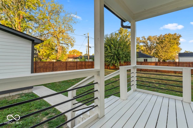 deck featuring a yard