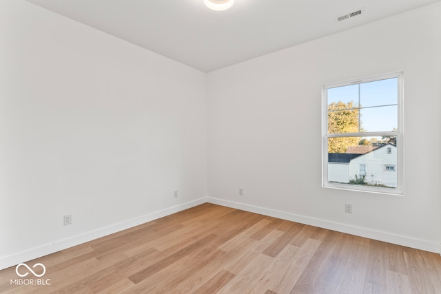 unfurnished room featuring light wood-type flooring