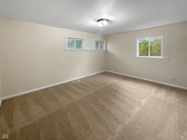 spare room with carpet floors