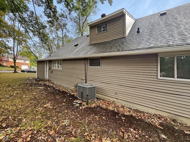 view of property exterior with central air condition unit