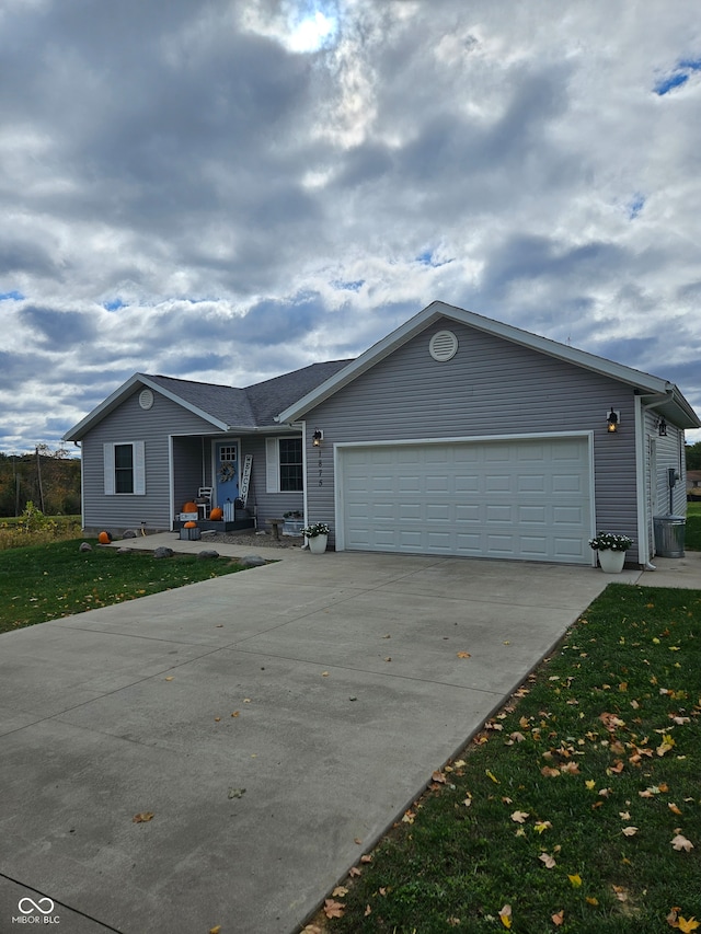 ranch-style house with a front lawn and a garage