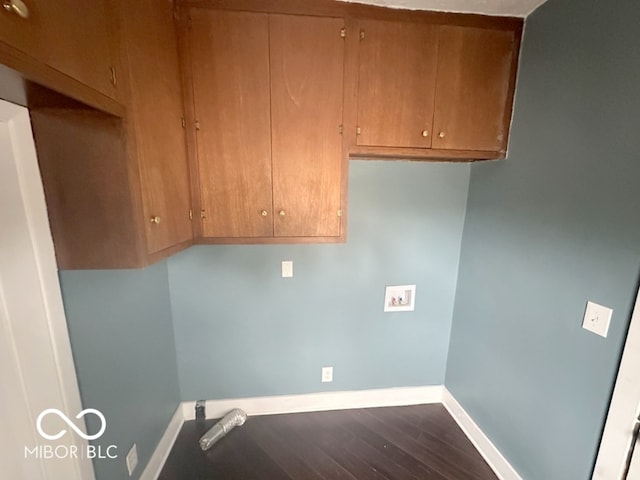 laundry room with hookup for a washing machine and dark hardwood / wood-style flooring