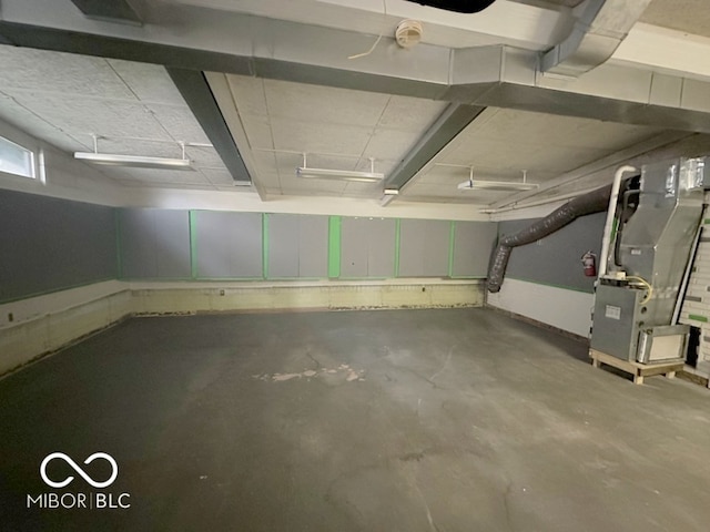 basement featuring heating unit