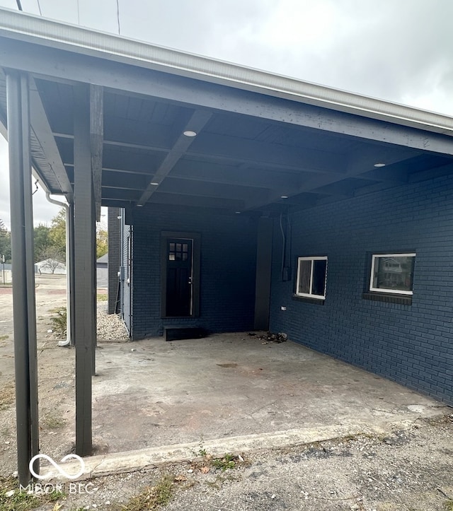 view of car parking featuring a carport