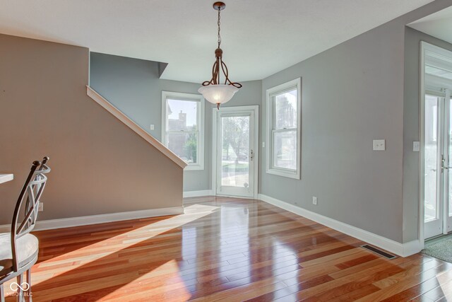 7189 Lockford N, Avon, IN 46123 - entryway with hardwood / wood-style floors and baseboards