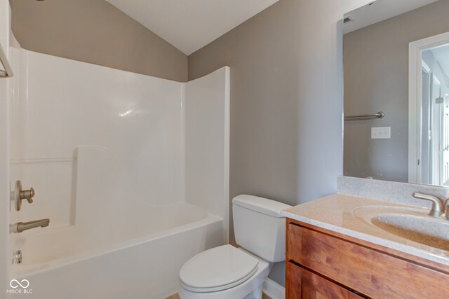 7189 Lockford N, Avon, IN 46123 - bathroom with toilet, vanity, lofted ceiling, and tub / shower combination