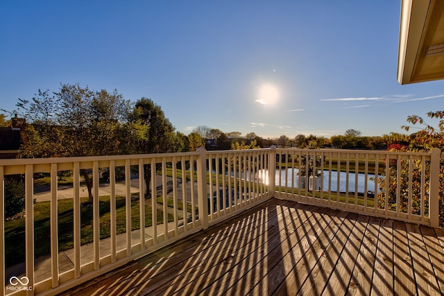 deck featuring a water view