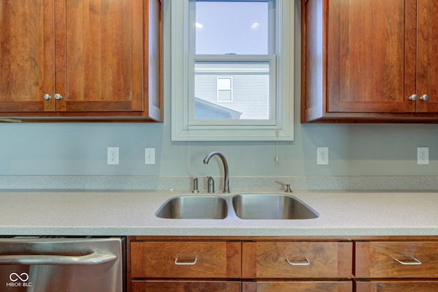 7189 Lockford N, Avon, IN 46123 - kitchen featuring a sink, dishwasher, brown cabinets, and light countertops