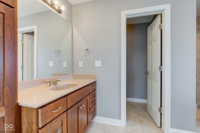 7189 Lockford N, Avon, IN 46123 - bathroom featuring tile patterned floors, vanity, and baseboards