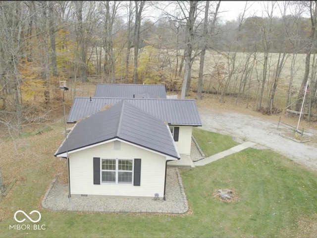 9540 E Brentmoore Rd, Brazil, IN 47834 - rear view of property featuring metal roof and a lawn