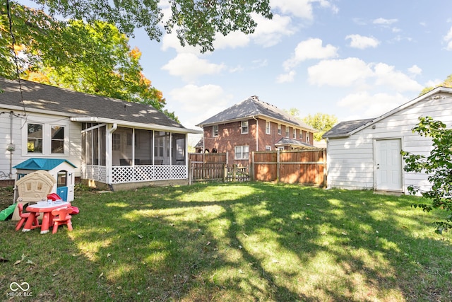 view of yard with a sunroom